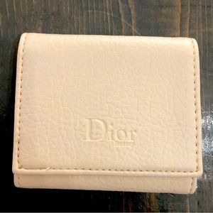 Dior wallet or credit card and ID holder.